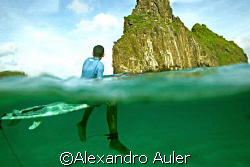 Young surfer at Cacimba do Padre's beach. Fernando de Nor... by Alexandro Auler 
